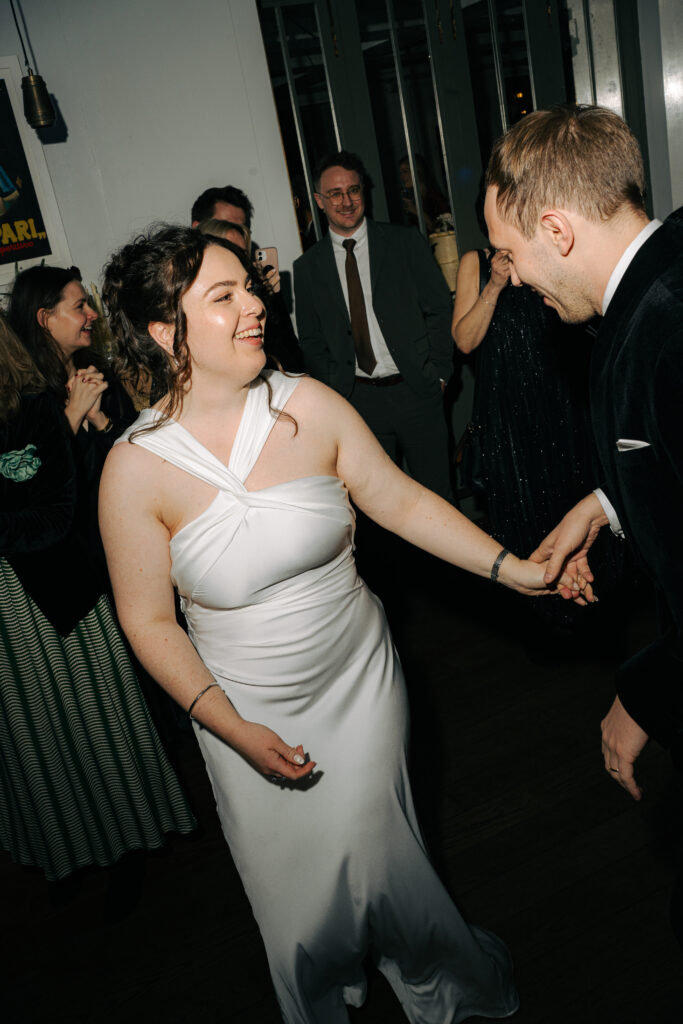 guests on dancefloor during evening reception at the italian greyhound