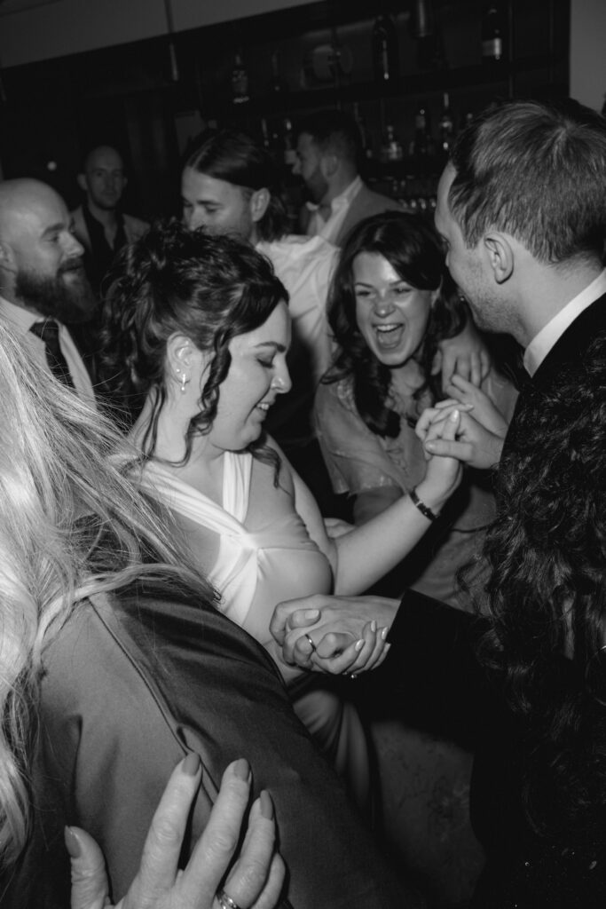 guests on dancefloor during evening reception at the italian greyhound
