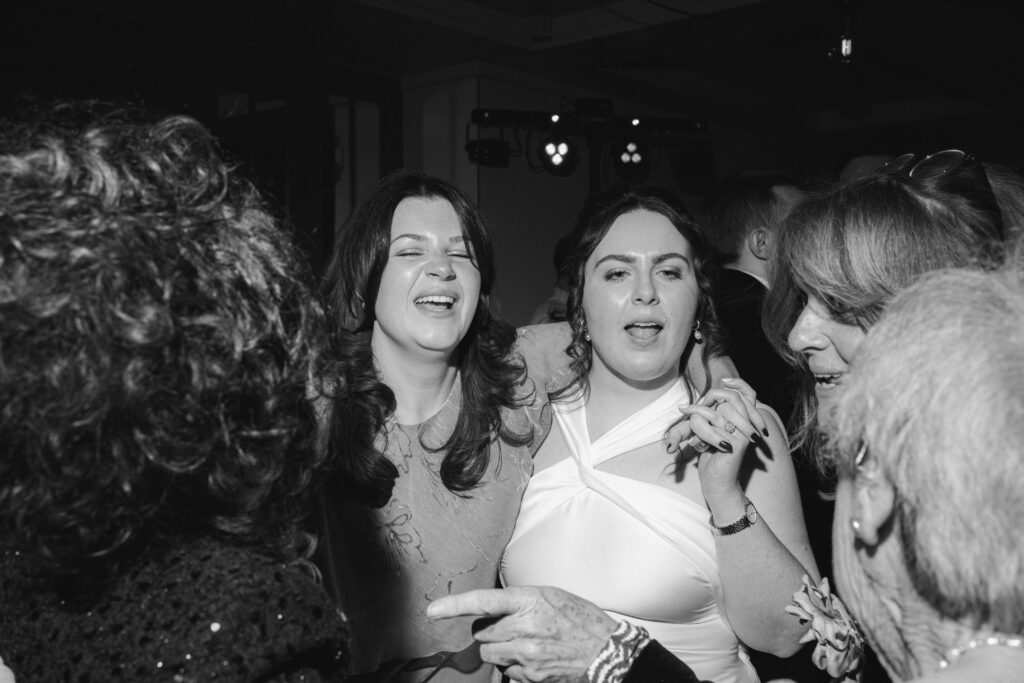 guests on dancefloor during evening reception at the italian greyhound