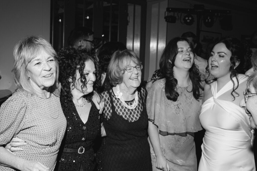 guests on dancefloor during evening reception at the italian greyhound
