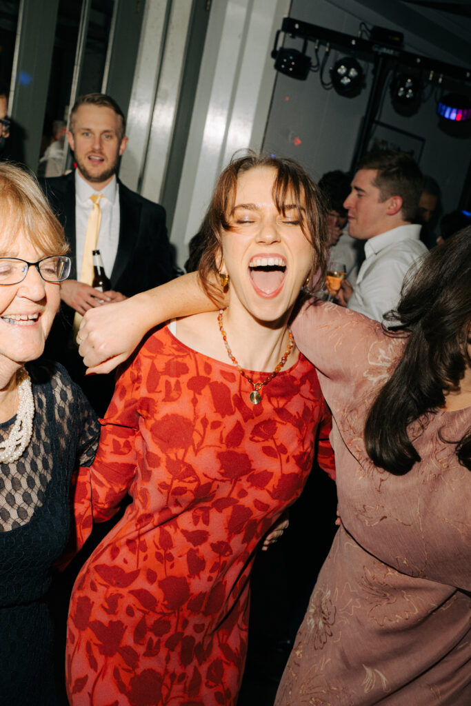 guests on dancefloor during evening reception at the italian greyhound