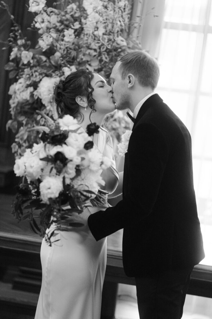 first kiss during intimate ceremony in the westminster room at the old marylebone town hall 