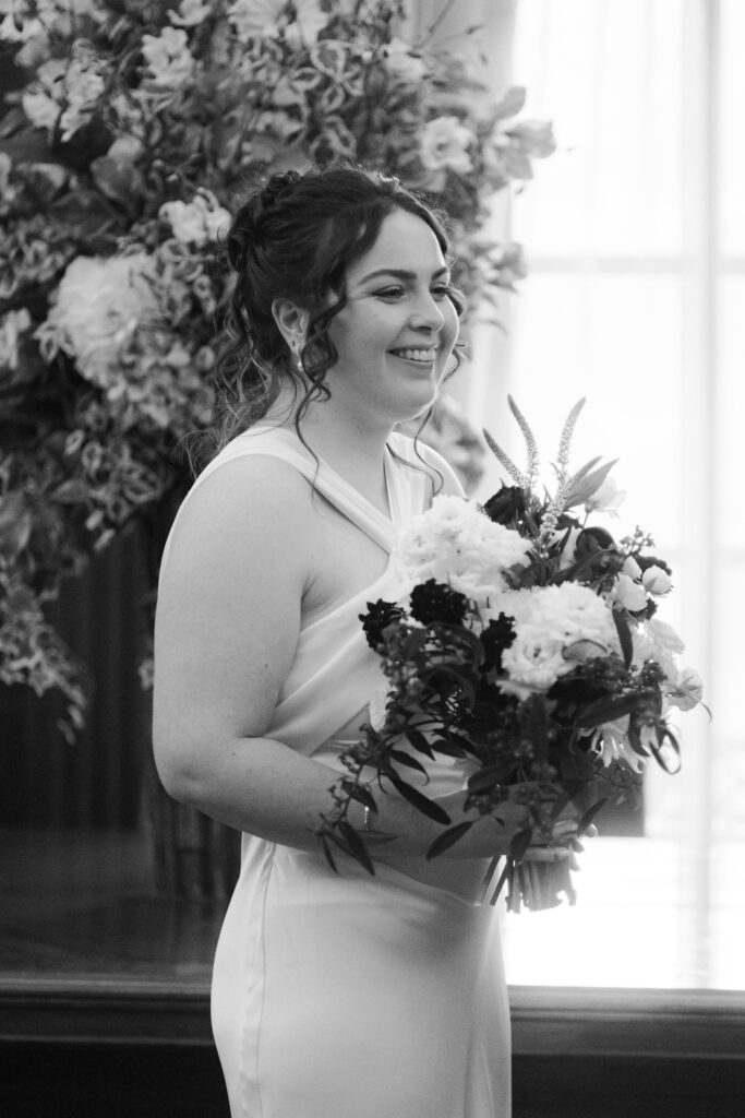 first kiss during intimate ceremony in the westminster room at the old marylebone town hall 