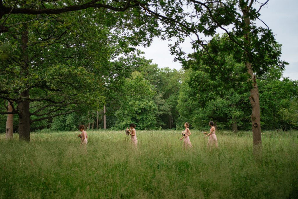 bridesmaids walking through dibbins wood
