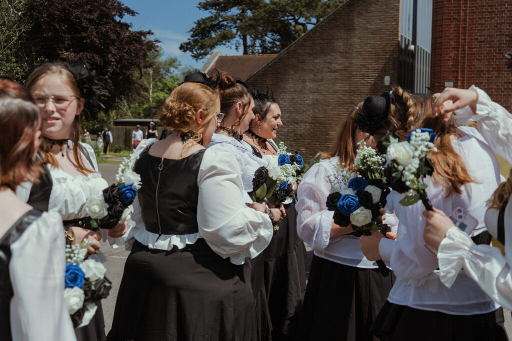 bridal party in steampunk bridesmaid dresses