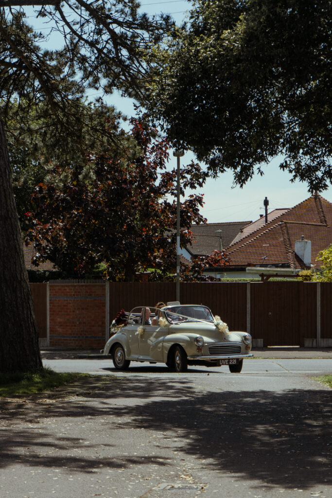 bride arriving in morris minor