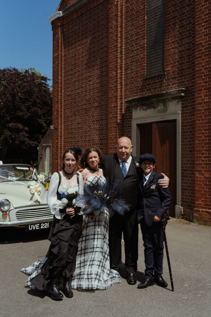 bride with family arriving in morris minor