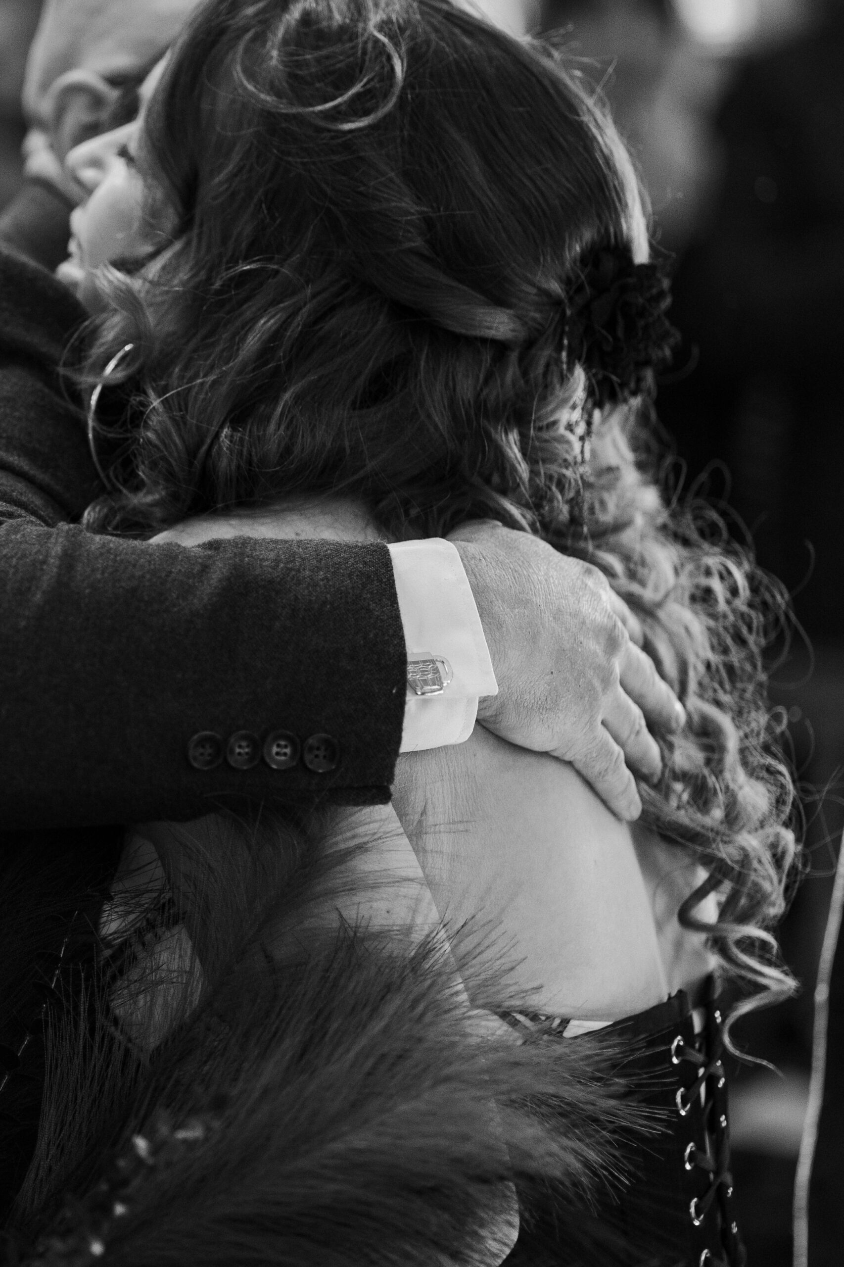 hugging groom at alter in st faiths church, lee-on-the-solent