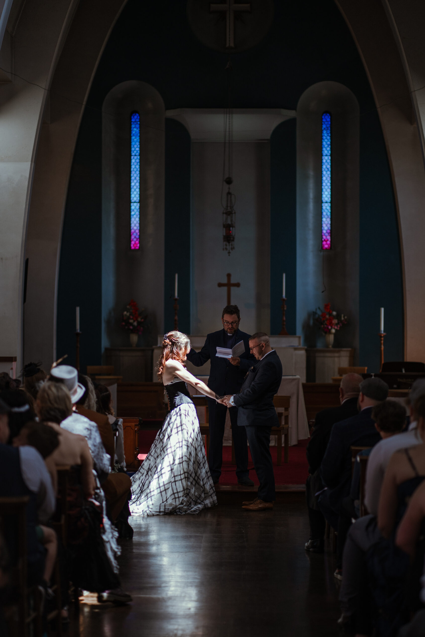 bride and groom at alter in st faith's church, lee-on-the-solent