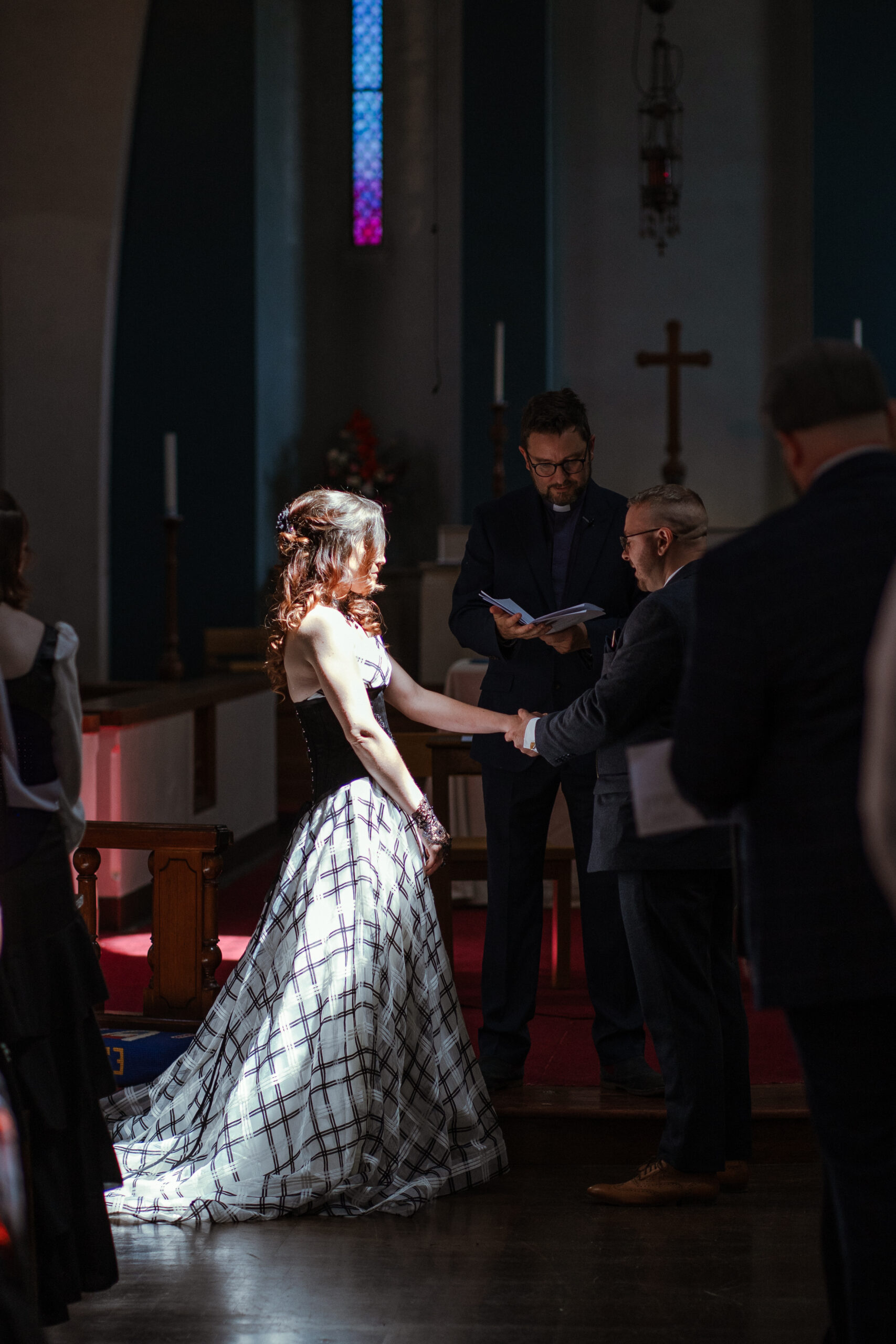 bride and groom at alter in st faith's church, lee-on-the-solent