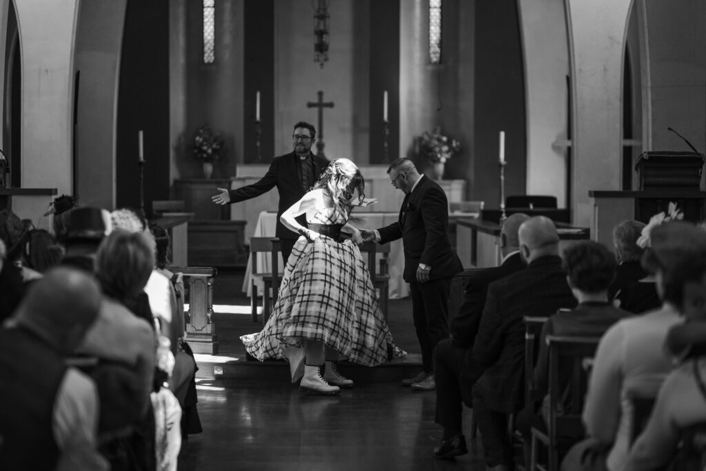 bride and groom at alter in st faith's church, lee-on-the-solent