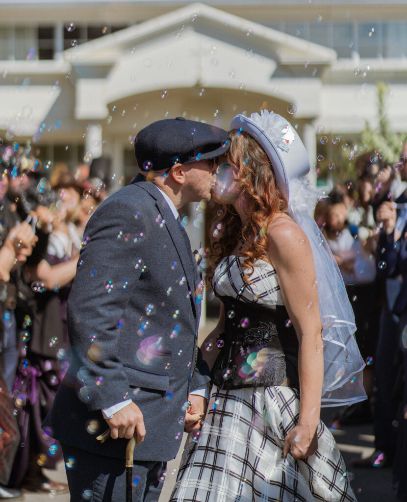 bride and groom with bubble confetti