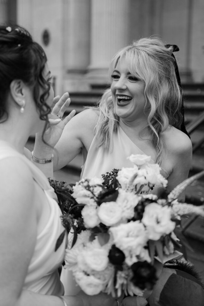 bride chatting with guests