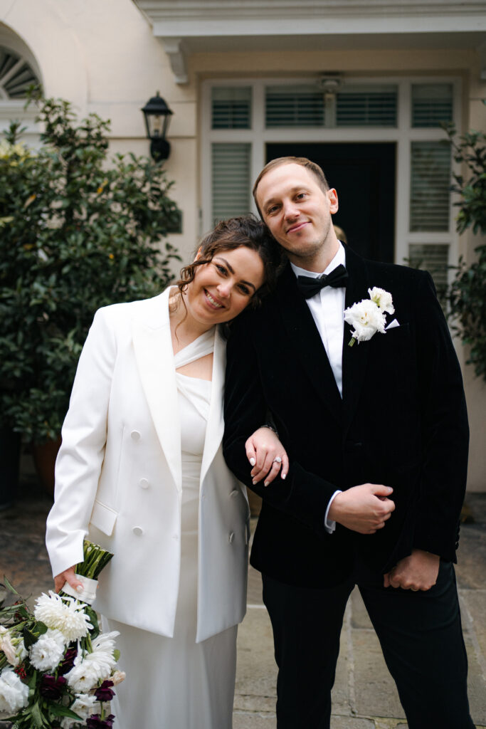 bride and groom portraits outside old marylebone town hall in london