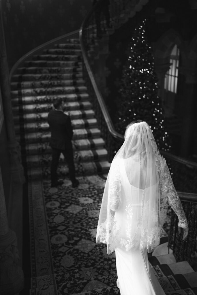 first look with groom on the grand staircase at St Pancras Renaissance Hotel 