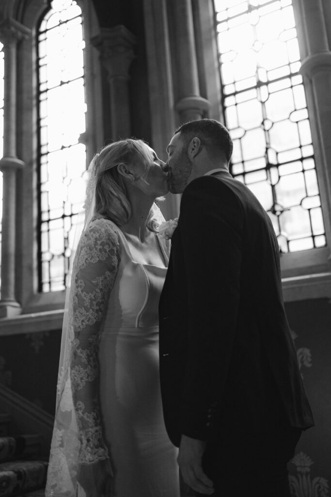 first look with groom on the grand staircase at St Pancras Renaissance Hotel