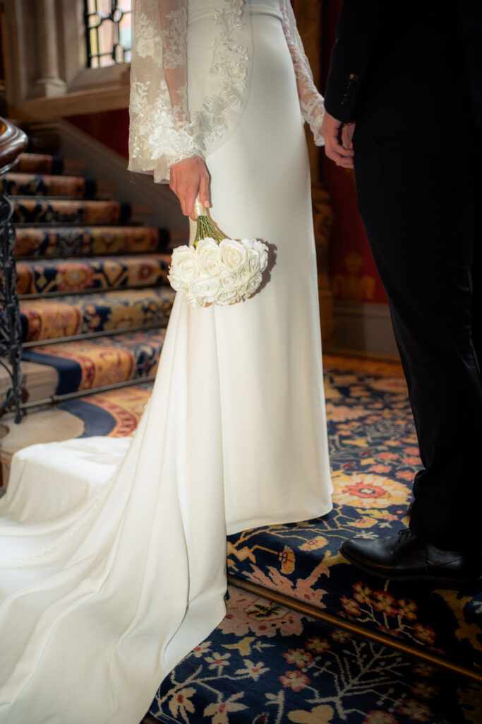 first look with groom on the grand staircase at St Pancras Renaissance Hotel 