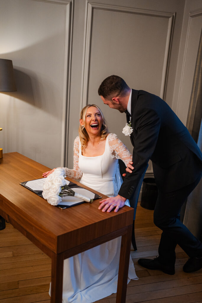 signing the register during elopement ceremony