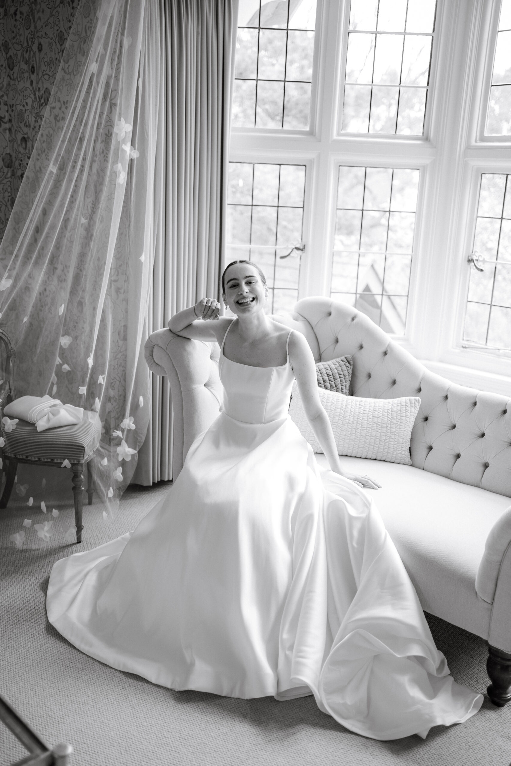 bridal portrait of charlotte in the bridal suite at baddow park house