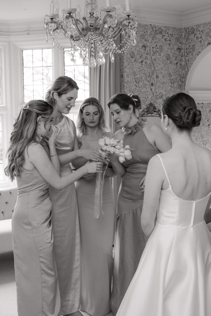 bridesmaids sorting the flowers for bride