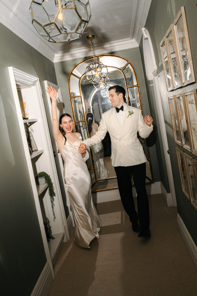 editorial portraits of bride and groom during wedding at baddow park house