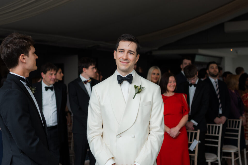 groom during ceremony at baddow park house