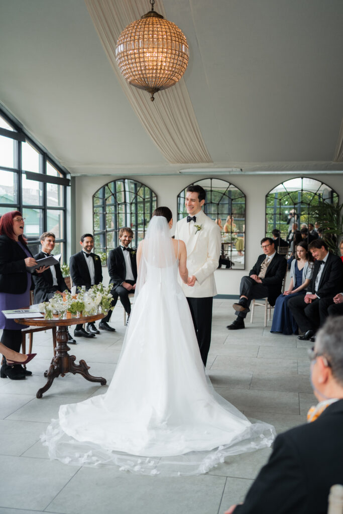 charlotte and jonathan standing at the aisle together