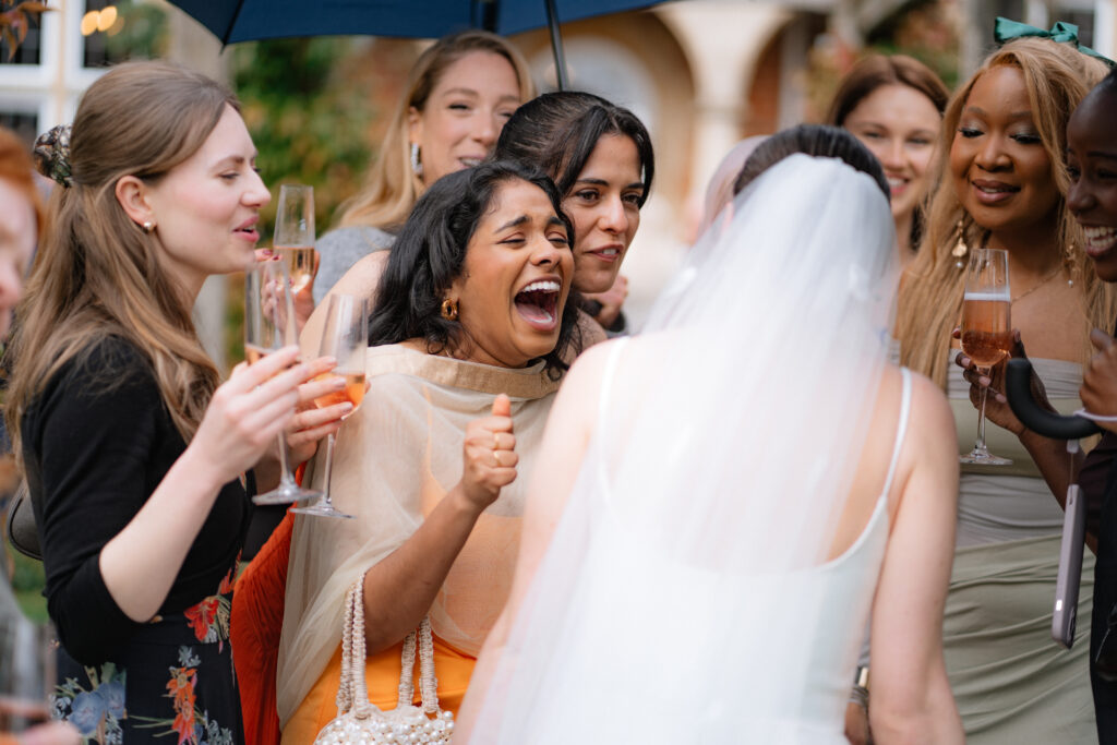 guest reaction during drinks reception at baddow park house